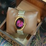 ساعة حريمى أستيك لولى أبيض مميز ميناء فوشيا مميزة