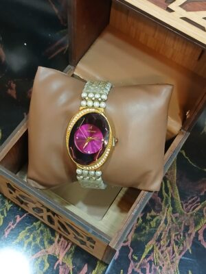 ساعة حريمى أستيك لولى أبيض مميز ميناء فوشيا مميزة