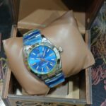 ساعة روليكس رجالى ميناء كحلى أستيك معدن سيلفر