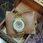 ساعة يد حريمى معدن جولد ميناء بأطار أبيض هاى كوبى